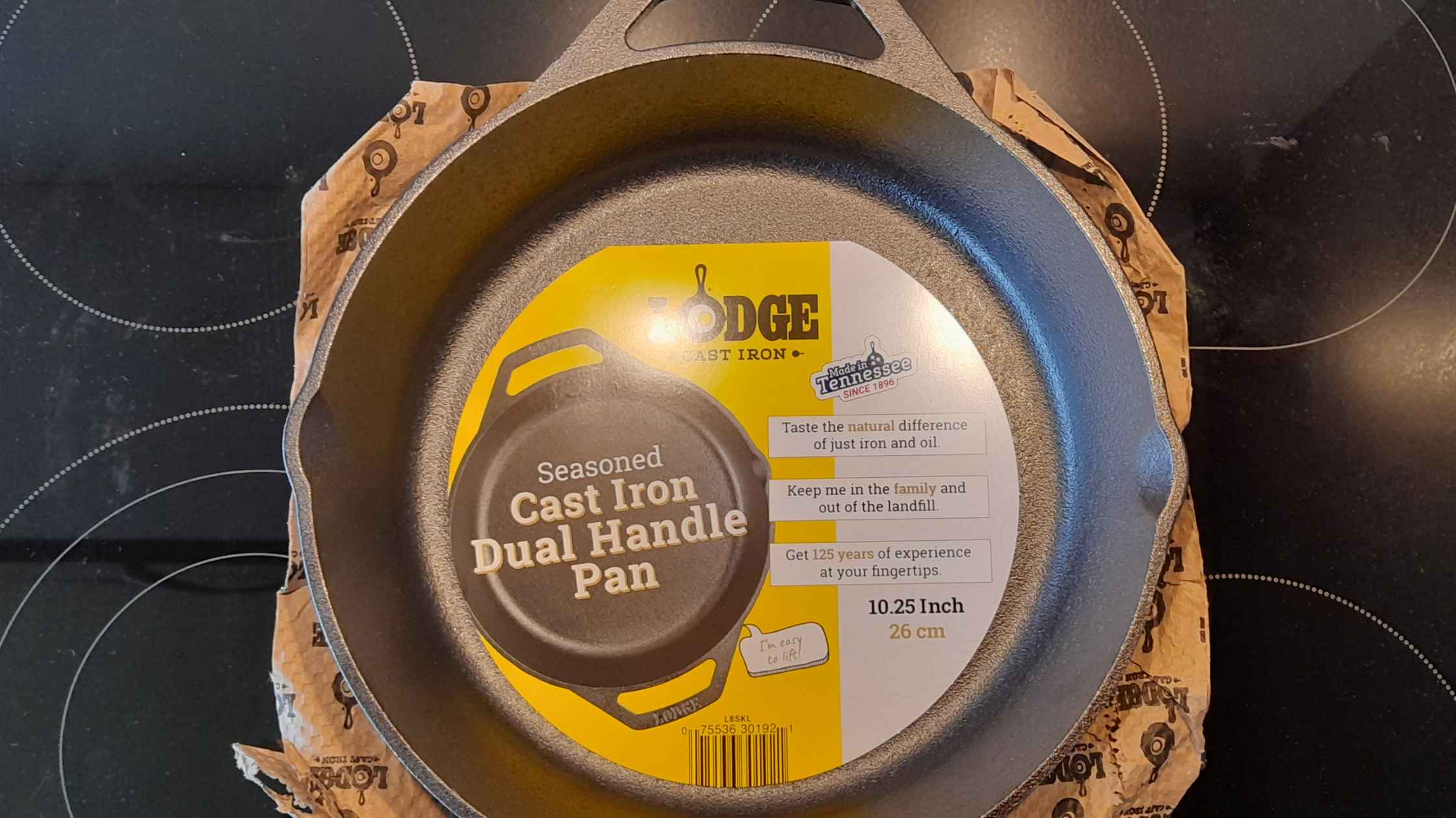 https://barbehow.com/wp-content/uploads/2023/01/Lodge-Cast-Iron-Dual-Handle-Pan-on-delivery.jpg